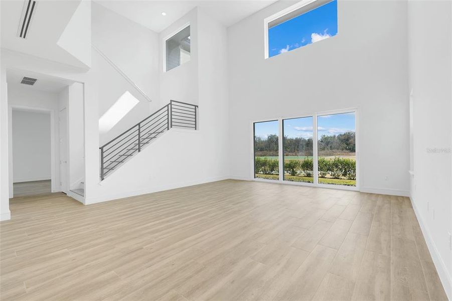 Spacious, unfurnished interior of a new home in Hampton Green at Providence, Davenport (Image 48).