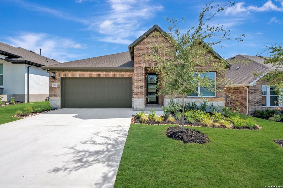 Front exterior of a new home in Meyer Ranch – Select Reserve Series, New Braunfels, TX, highlighting curb appeal (Image 1). Front exterior of a new home in Meyer Ranch – Select Reserve Series, New Braunfels, TX, highlighting curb appeal (Image 1).