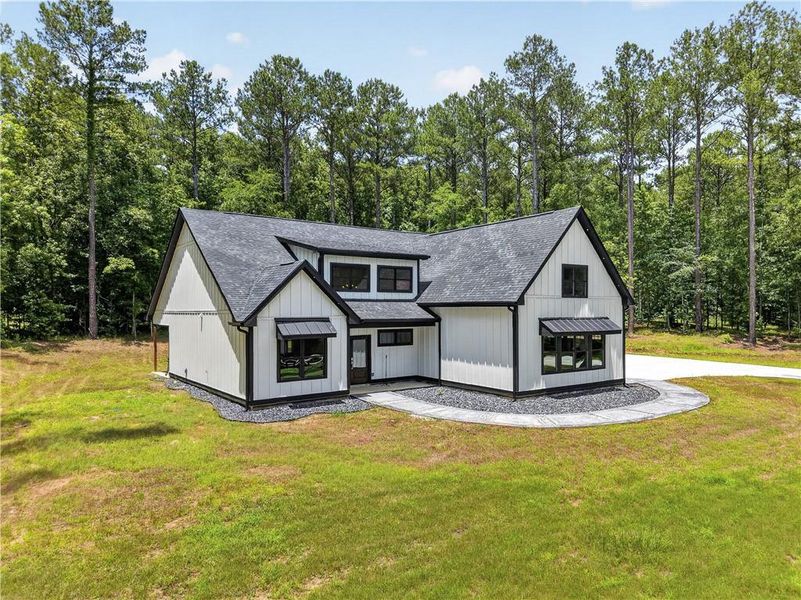Front exterior of a new home in , Buckhead, GA, highlighting curb appeal (Image 27). Front exterior of a new home in , Buckhead, GA, highlighting curb appeal (Image 27).