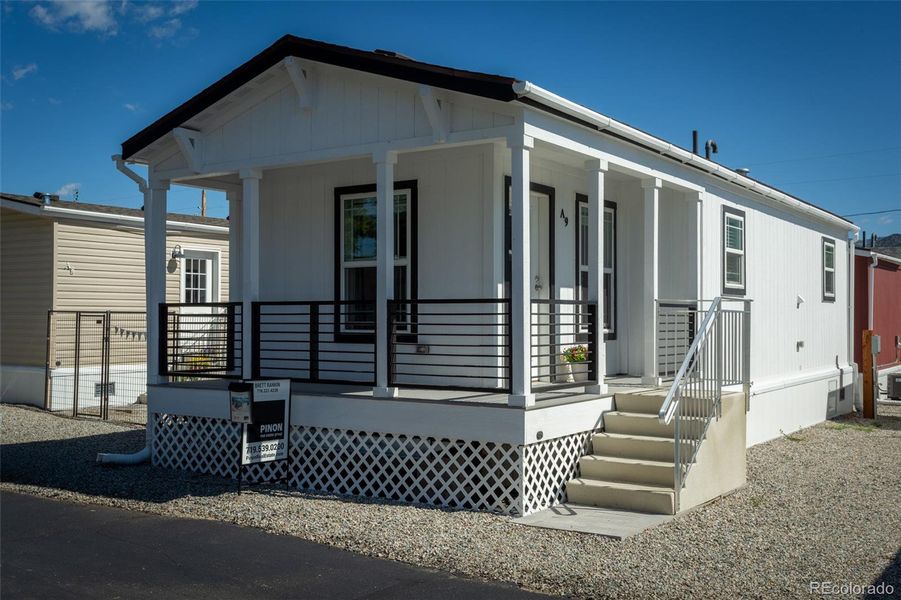 Front exterior of a new home in , Salida, CO, highlighting curb appeal (Image 15).