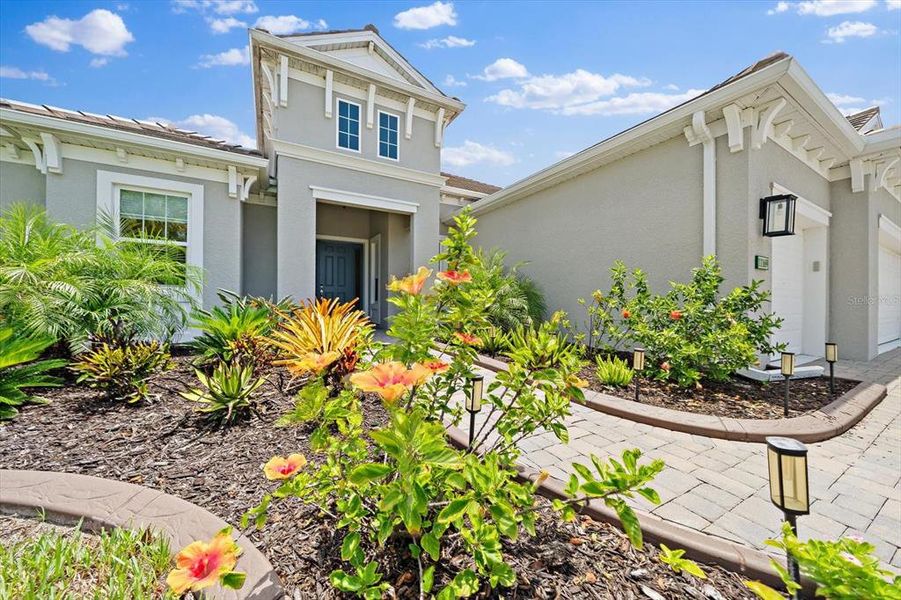 Front exterior of a new home in , Englewood, FL, highlighting curb appeal (Image 23). Front exterior of a new home in , Englewood, FL, highlighting curb appeal (Image 23).