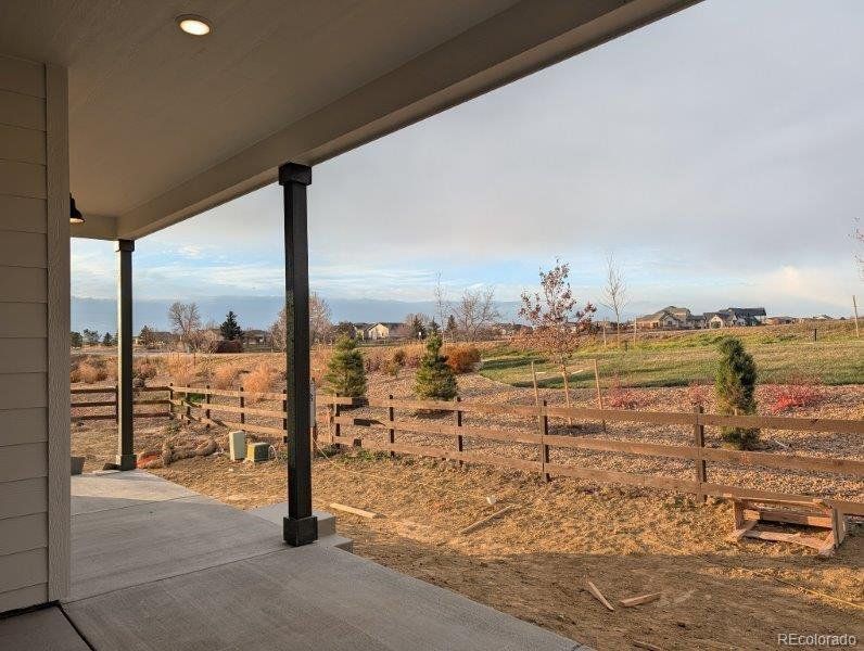 Exterior details and patio area of a home in Highlands Preserve, Mead (Image 2).