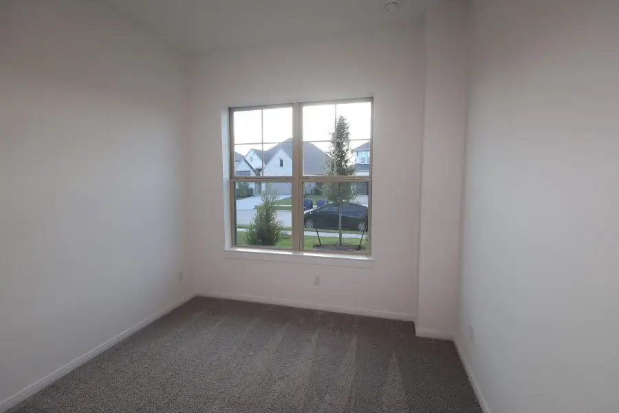 Spacious, unfurnished interior of a new home in Meridiana - Terrace Collection, Manvel (Image 9).