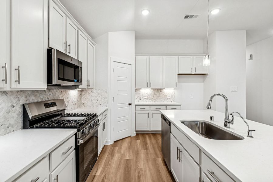 Furnished interior view inside a new home in Pinewood at Grand Texas, New Caney (Image 8). Furnished interior view inside a new home in Pinewood at Grand Texas, New Caney (Image 8).