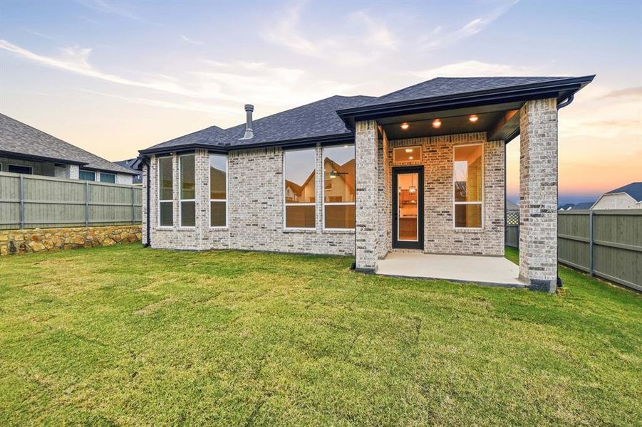 Exterior details and patio area of a home in Pecan Square: 50ft. lots, Northlake (Image 20).