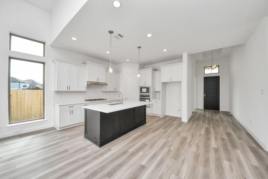 Furnished interior view inside a new home in Marvida, Cypress (Image 4).