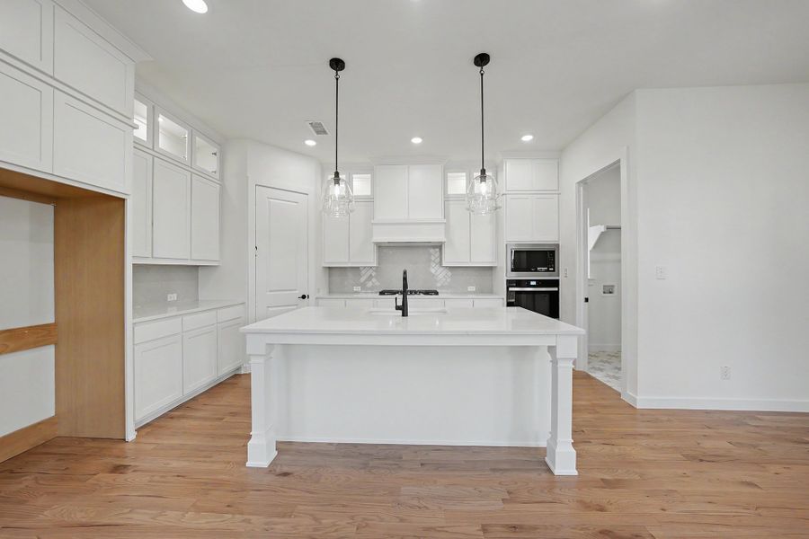 Furnished interior view inside a new home in Light Farms Brenham - 40' Lots, Celina (Image 8).