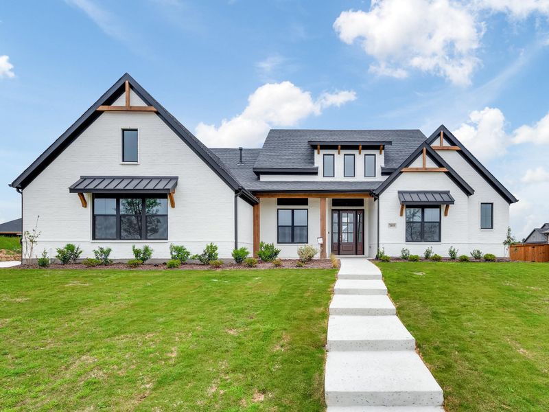Representative exterior photo of a completed home built from the Cordova by Our Country Homes in NorthGlen, Haslet, TX (Image 5).