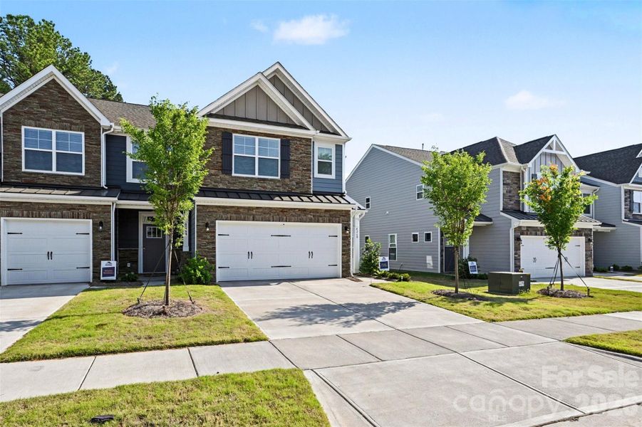 Front exterior of a new home in , Harrisburg, NC, highlighting curb appeal (Image 21). Front exterior of a new home in , Harrisburg, NC, highlighting curb appeal (Image 21).