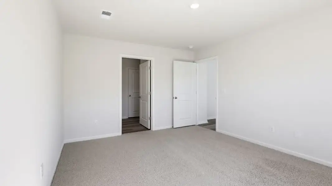 Spacious, unfurnished interior of a new home in Waverly Station, Greenwood (Image 31).