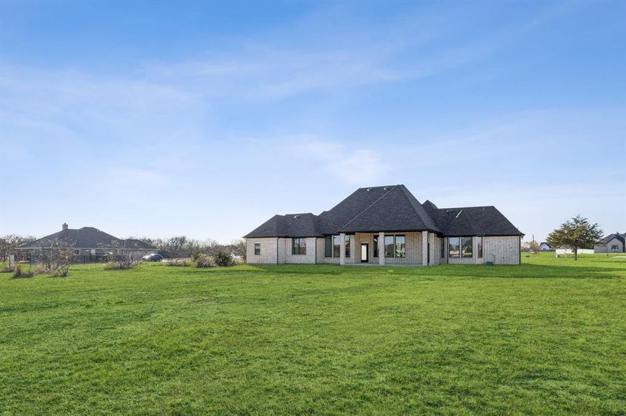 Exterior details and patio area of a home in , Royse City (Image 19). Exterior details and patio area of a home in , Royse City (Image 19).
