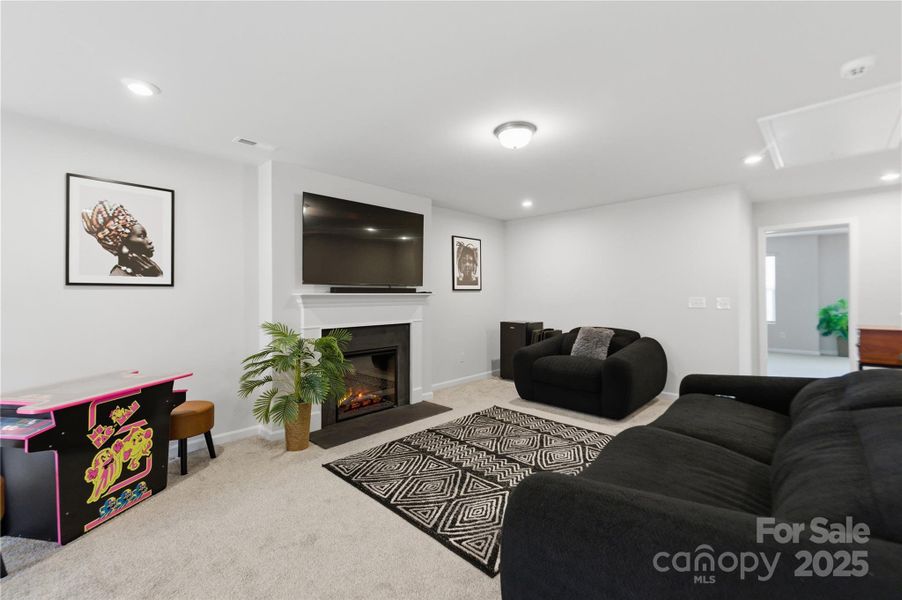 Loft with electric fireplace