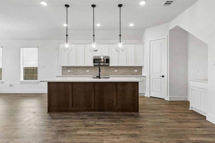 Furnished interior view inside a new home in Brahman Ranch, Venus (Image 13).
