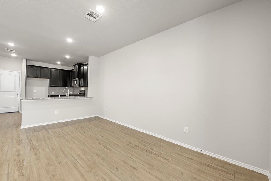 Feel like a part of all the fun with the openness of this kitchen and family room during all your gatherings! Feel like a part of all the fun with the openness of this kitchen and family room during all your gatherings!