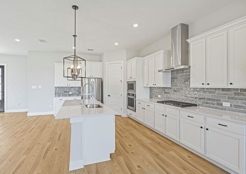 The kitchen has a convenient island. The kitchen has a convenient island.