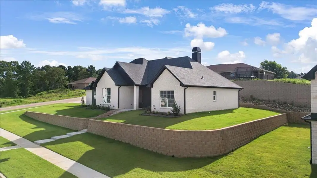 Front exterior of a new home in , Lindale, TX, highlighting curb appeal (Image 15). Front exterior of a new home in , Lindale, TX, highlighting curb appeal (Image 15).