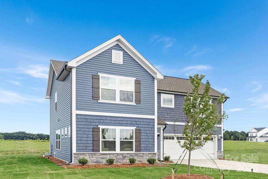 Front exterior of a new home in , New London, NC, highlighting curb appeal (Image 20).