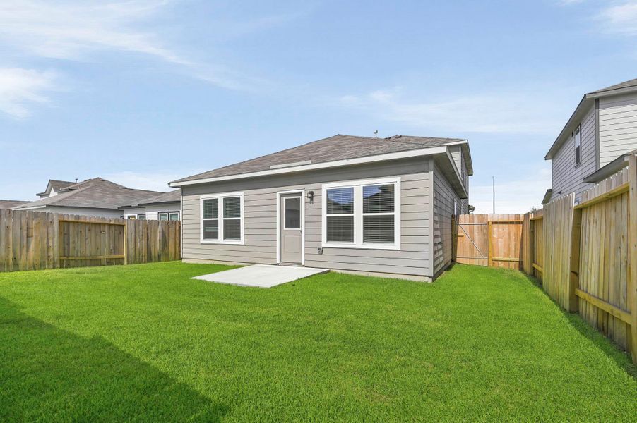 Exterior details and patio area of a home in Barrett Crossing, Crosby (Image 19).