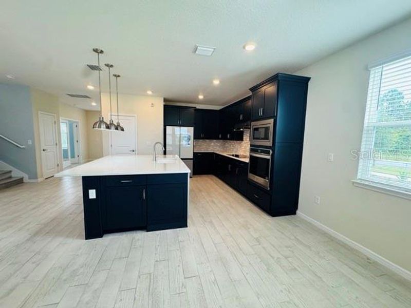 Furnished interior view inside a new home in , St. Cloud (Image 5).