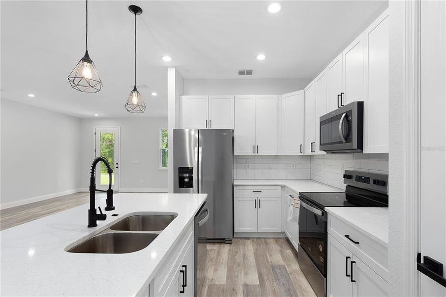 Furnished interior view inside a new home in , North Port (Image 13).