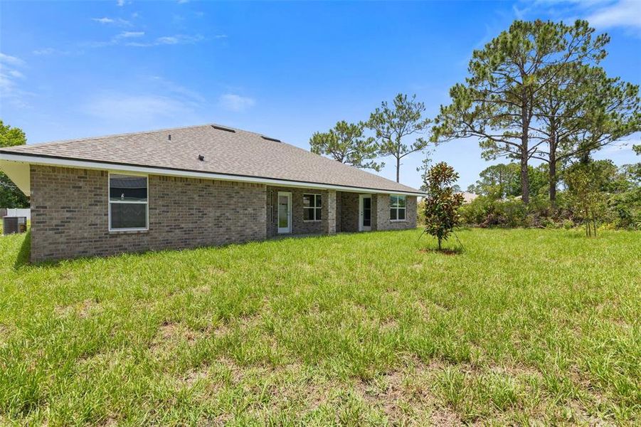 Exterior details and patio area of a home in , Palm Coast (Image 37).