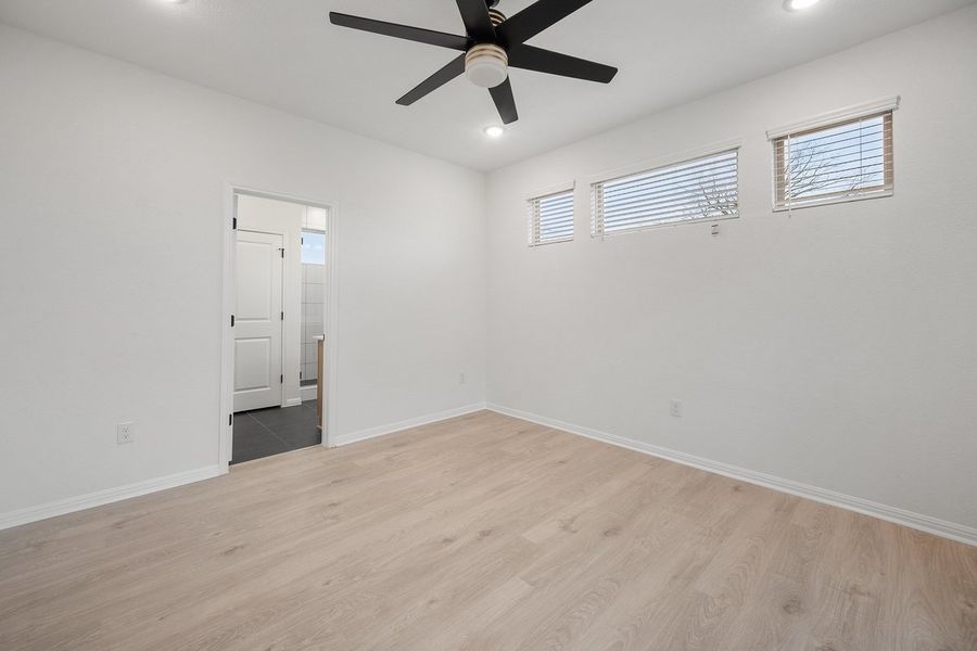 Spacious, unfurnished interior of a new home in The Hills of Bear Creek, Manchaca (Image 21).