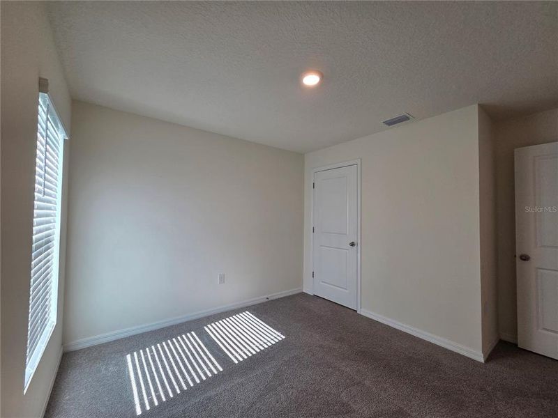 Spacious, unfurnished interior of a new home in Hernando County Spot Lots, Spring Hill (Image 23).