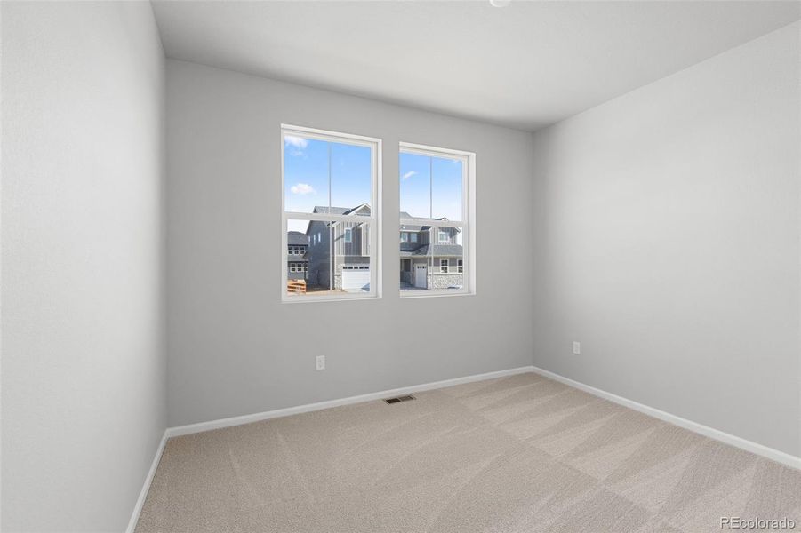 Spacious, unfurnished interior of a new home in Talon Pointe, Thornton (Image 23).