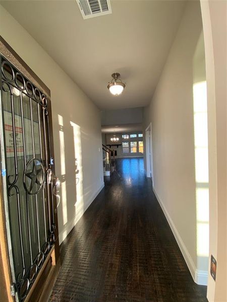 Entry with rich hardwood floors