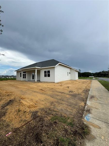 In-progress construction of a new home in Laureate Village, Newberry, FL (Image 12).