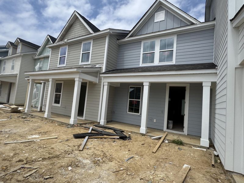 Front exterior of a new home in Abbey Walk, Moncks Corner, SC, highlighting curb appeal (Image 2).