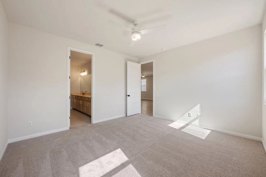 Spacious, unfurnished interior of a new home in Cannon Ranch, Dripping Springs (Image 32).