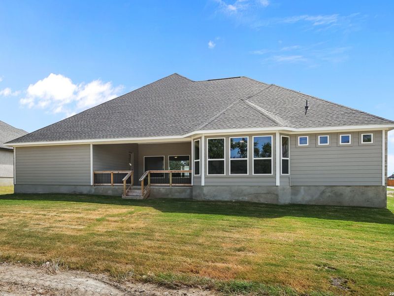 Exterior details and patio area of a home in Potranco Oaks, Castroville (Image 26).