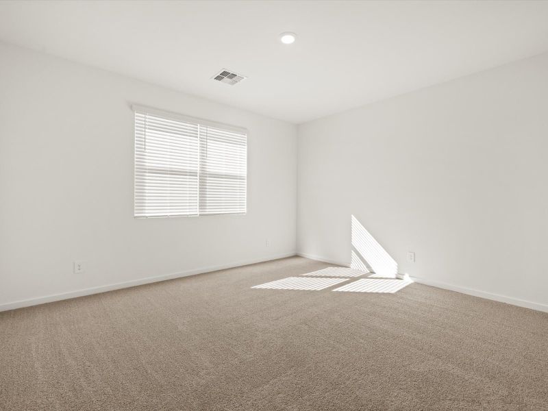Spacious, unfurnished interior of a new home in Mountain View Estates Signature Series, Buckeye (Image 13).