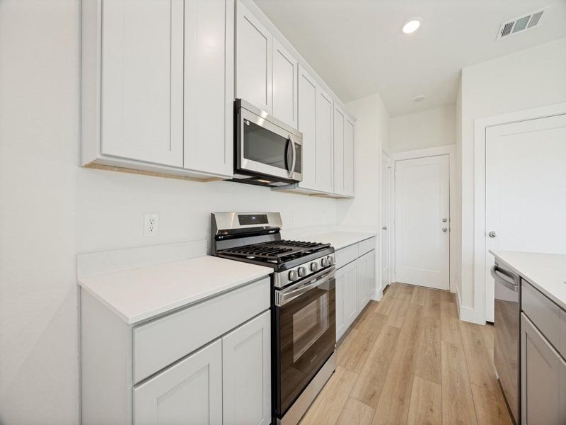 Furnished interior view inside a new home in Pebblebrook, Sherman (Image 6).