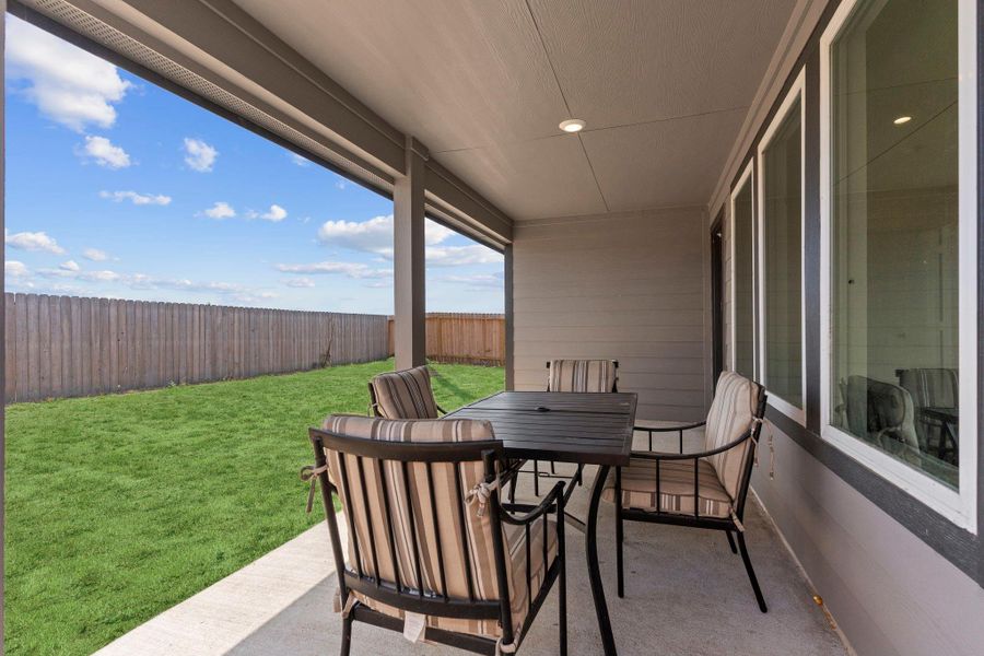 Exterior details and patio area of a home in Emberly, Beasley (Image 2).