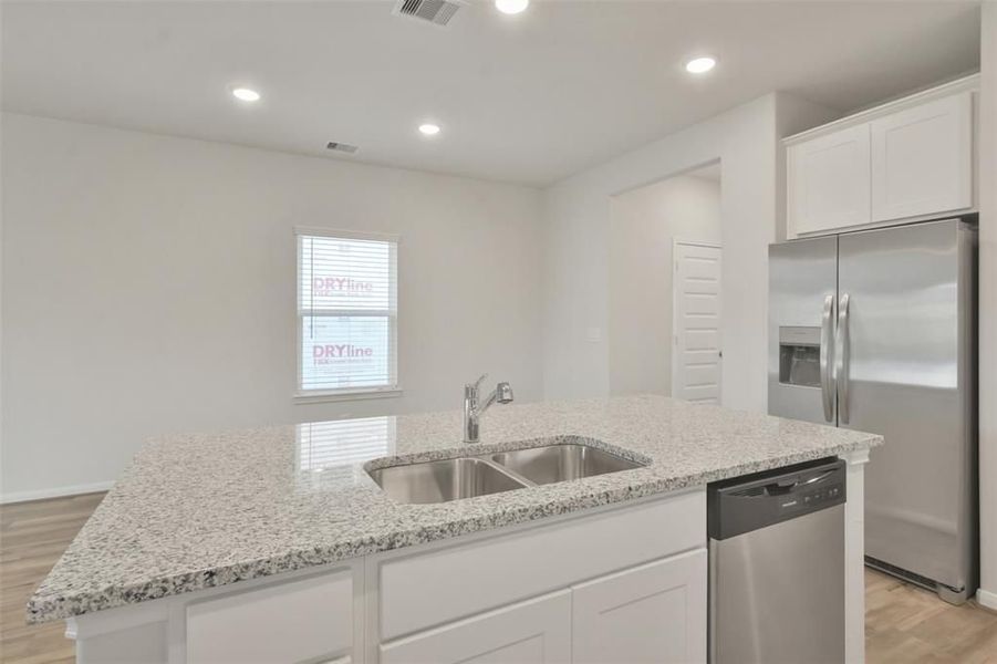 Furnished interior view inside a new home in Lakes at Black Oak, Magnolia (Image 13).