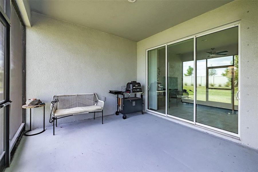 Exterior details and patio area of a home in Prosperity Lakes, Parrish (Image 4).