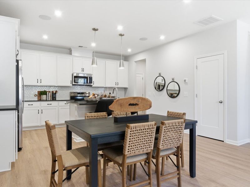 Representative furnished interior of a home built from the Avett by Tri Pointe Homes in Ellis Townes, Charlotte (Image 43).