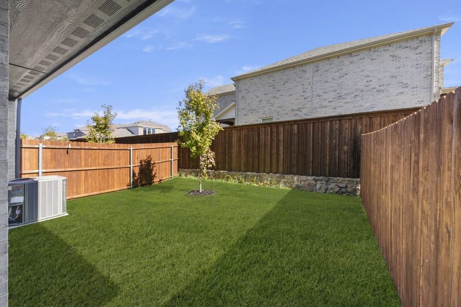 Front exterior of a new home in Sereno Oaks at Buckner Terrace, Dallas, TX, highlighting curb appeal (Image 28). Front exterior of a new home in Sereno Oaks at Buckner Terrace, Dallas, TX, highlighting curb appeal (Image 28).