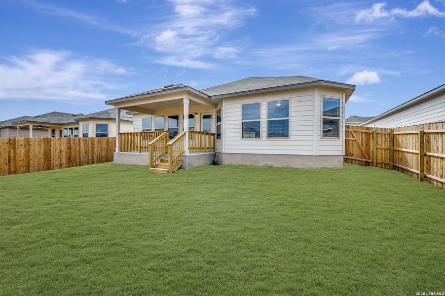 Exterior details and patio area of a home in Winding Brook, San Antonio (Image 26).