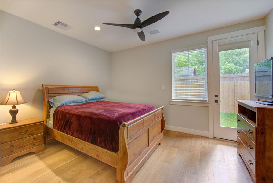 First floor bedroom with access to backyard.