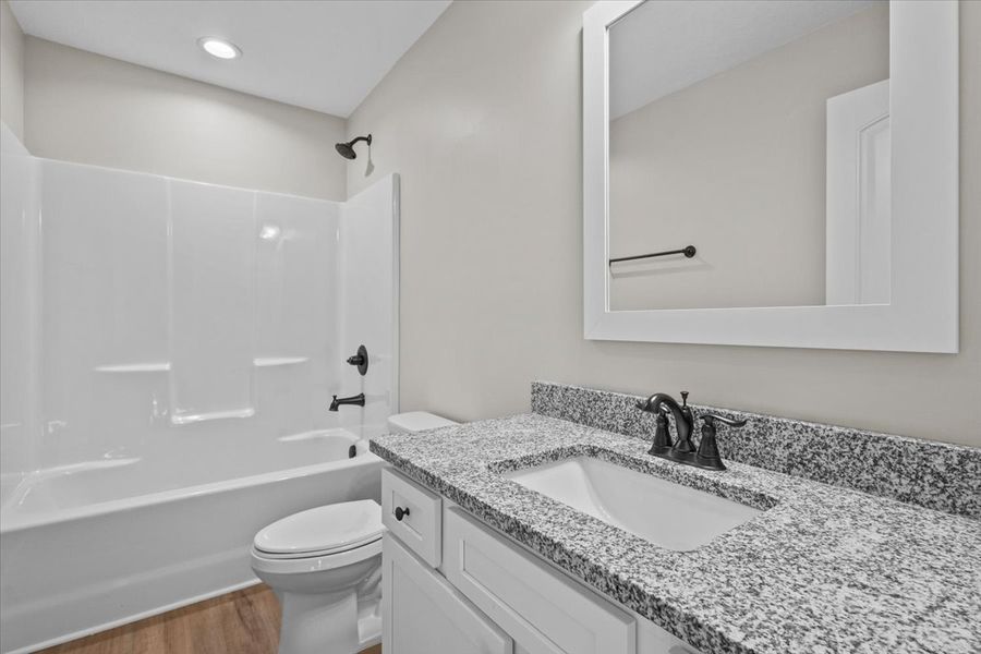 Representative furnished interior of a home built from the Iris by Enchanted Homes in Hampshire Heights, Moore (Image 7).