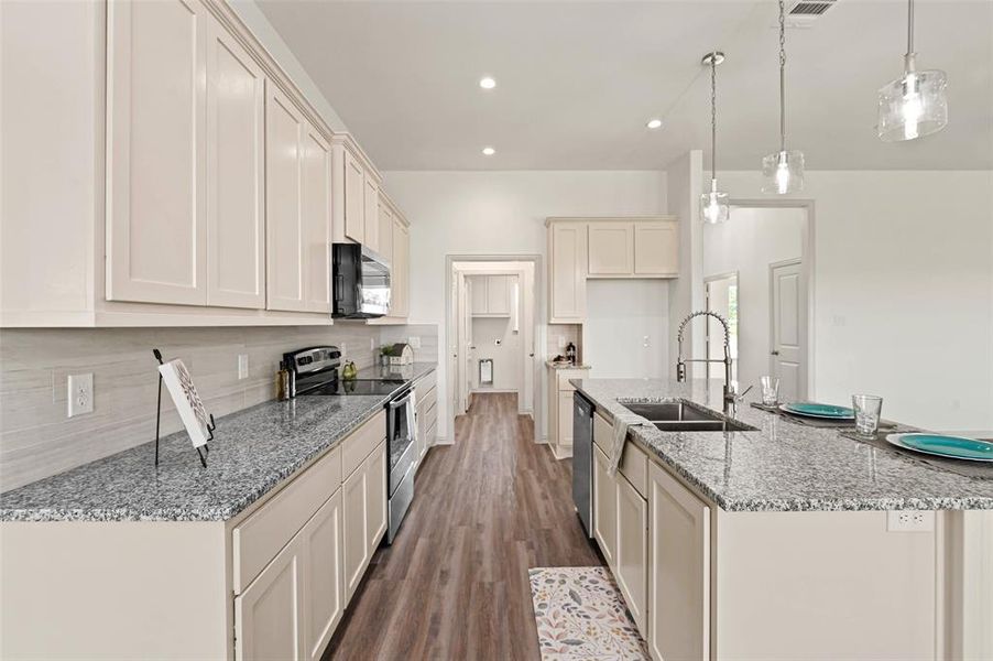 Kitchen with Doves Nest Collection and Brushed Nickel Fixture Package