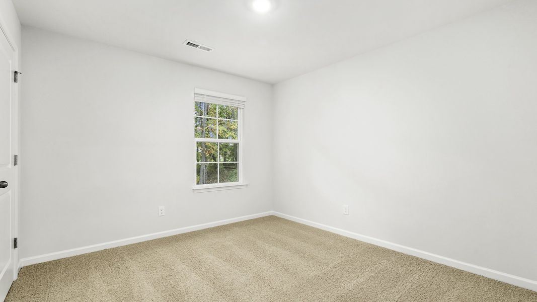 Spacious, unfurnished interior of a new home in Greystone North, Stoneville (Image 15).