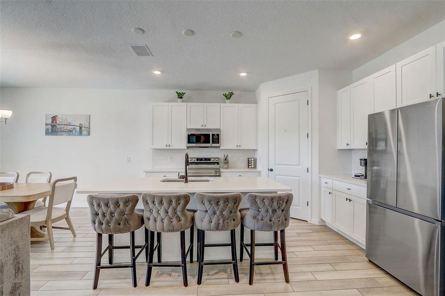 Furnished interior view inside a new home in Glen at West Haven, Davenport (Image 15).