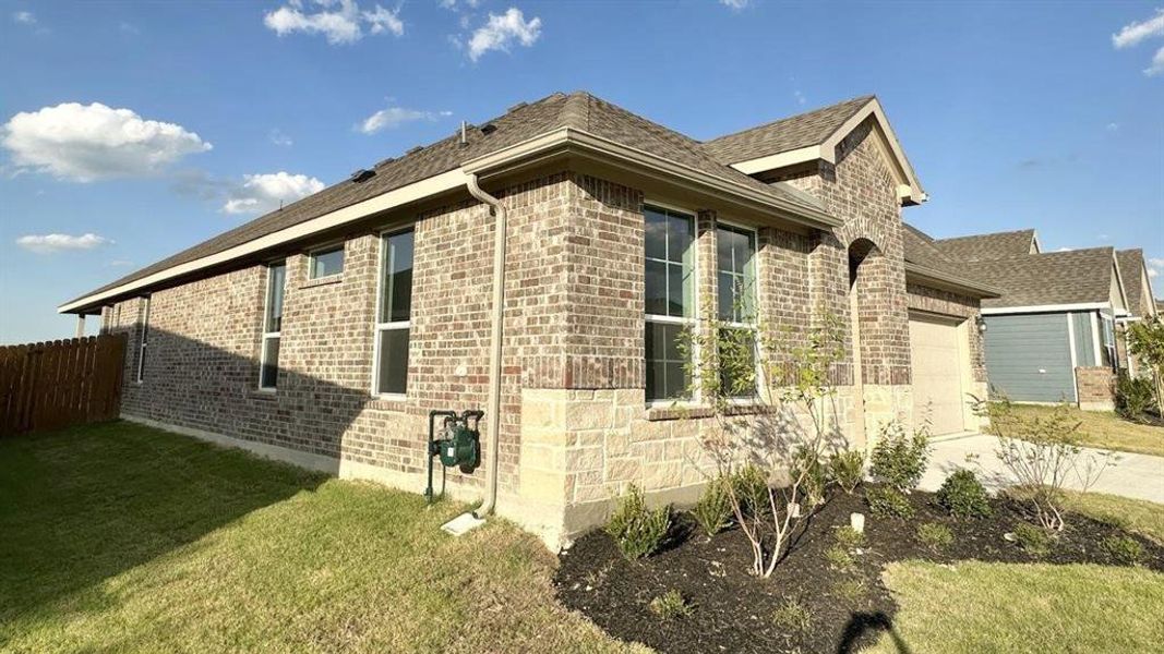 Exterior details and patio area of a home in Rock Creek Ranch, Fort Worth (Image 15).