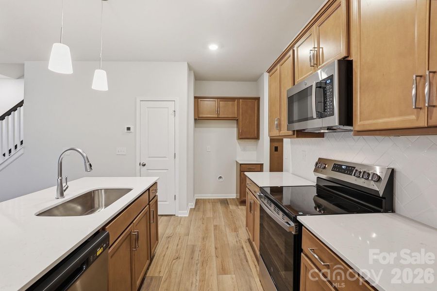 Furnished interior view inside a new home in Sloan Station, Charlotte (Image 7).