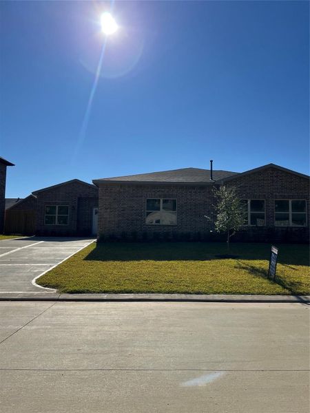 Exterior details and patio area of a home in , Spring (Image 17). Exterior details and patio area of a home in , Spring (Image 17).