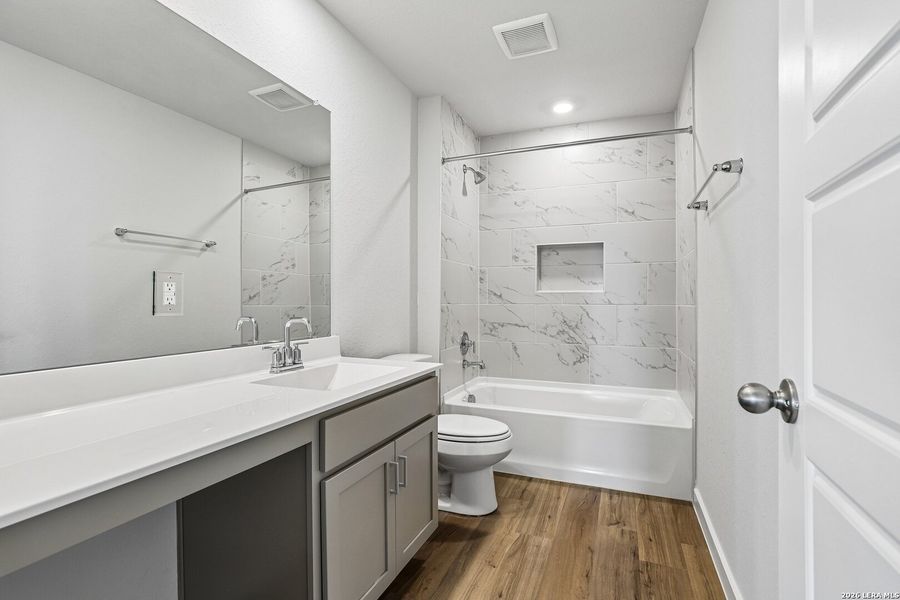 Furnished interior view inside a new home in Weston Oaks, San Antonio (Image 10).